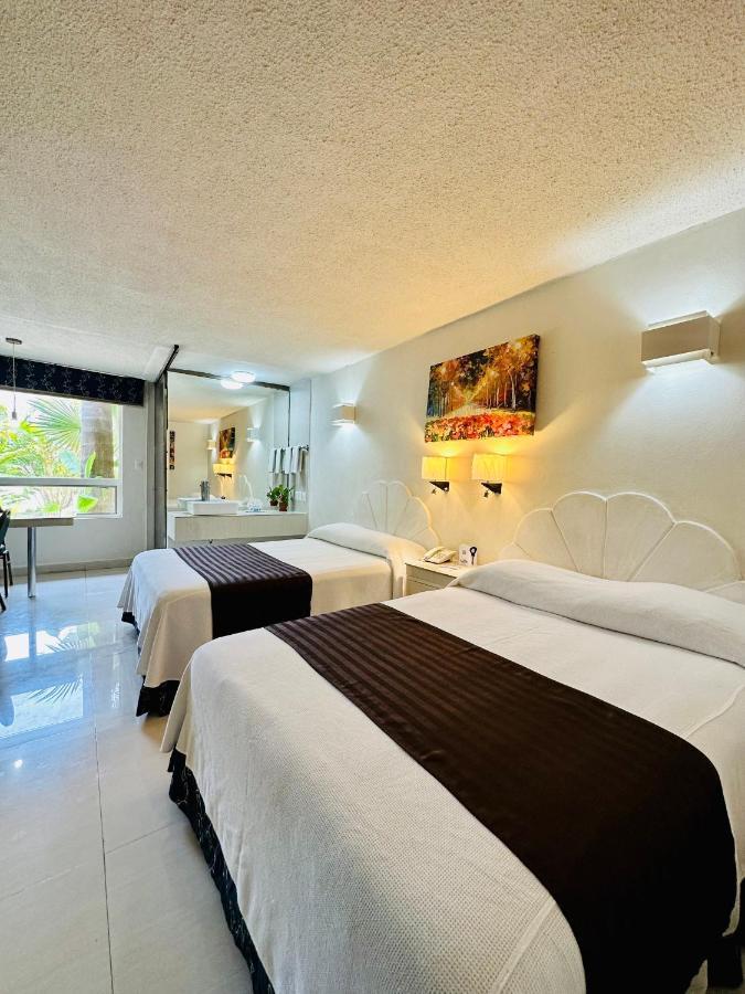 Hotel Plaza Caribe Cancún Buitenkant foto